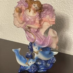 Angel With Two Dolphins