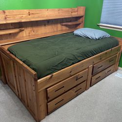 Raised Twin Bed Frame With Drawers, Bookshelf, And Under bed Storage