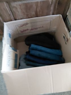 Boses and bag of women's clothes