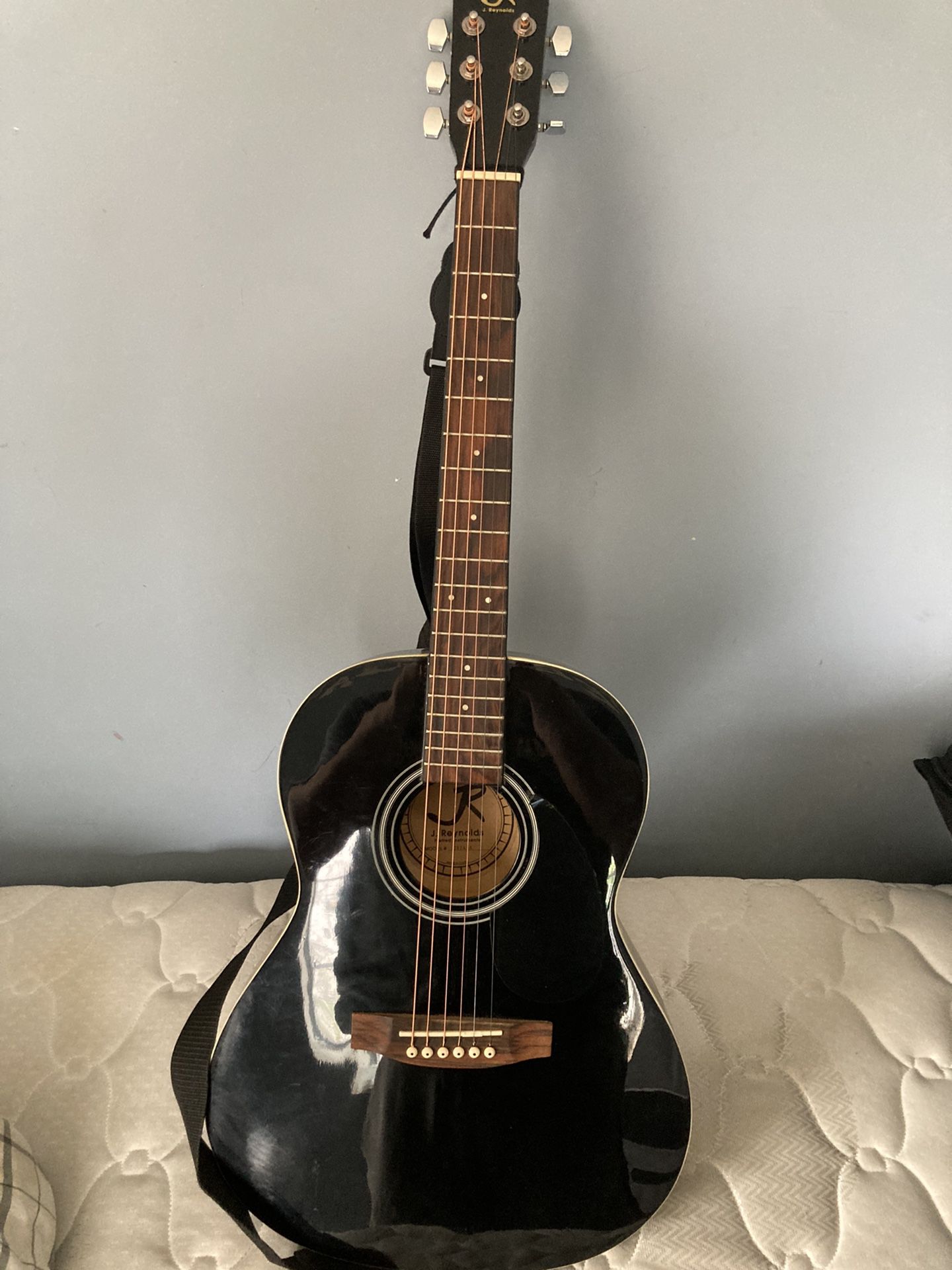 j. reynolds’s guitar with bag . Black original strings and belt 