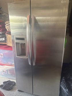 LG refrigerator (two side by side door open)