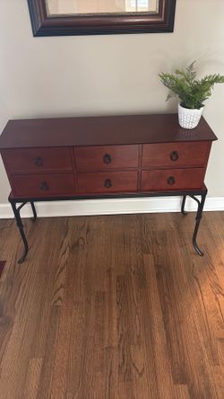 Sideboard with Black Metal Legs along with Wall Picture