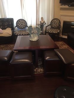 Wood and leather coffee table w/4 rolling storage ottomans