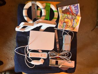 Wii console, games, wheels, and a Zapper