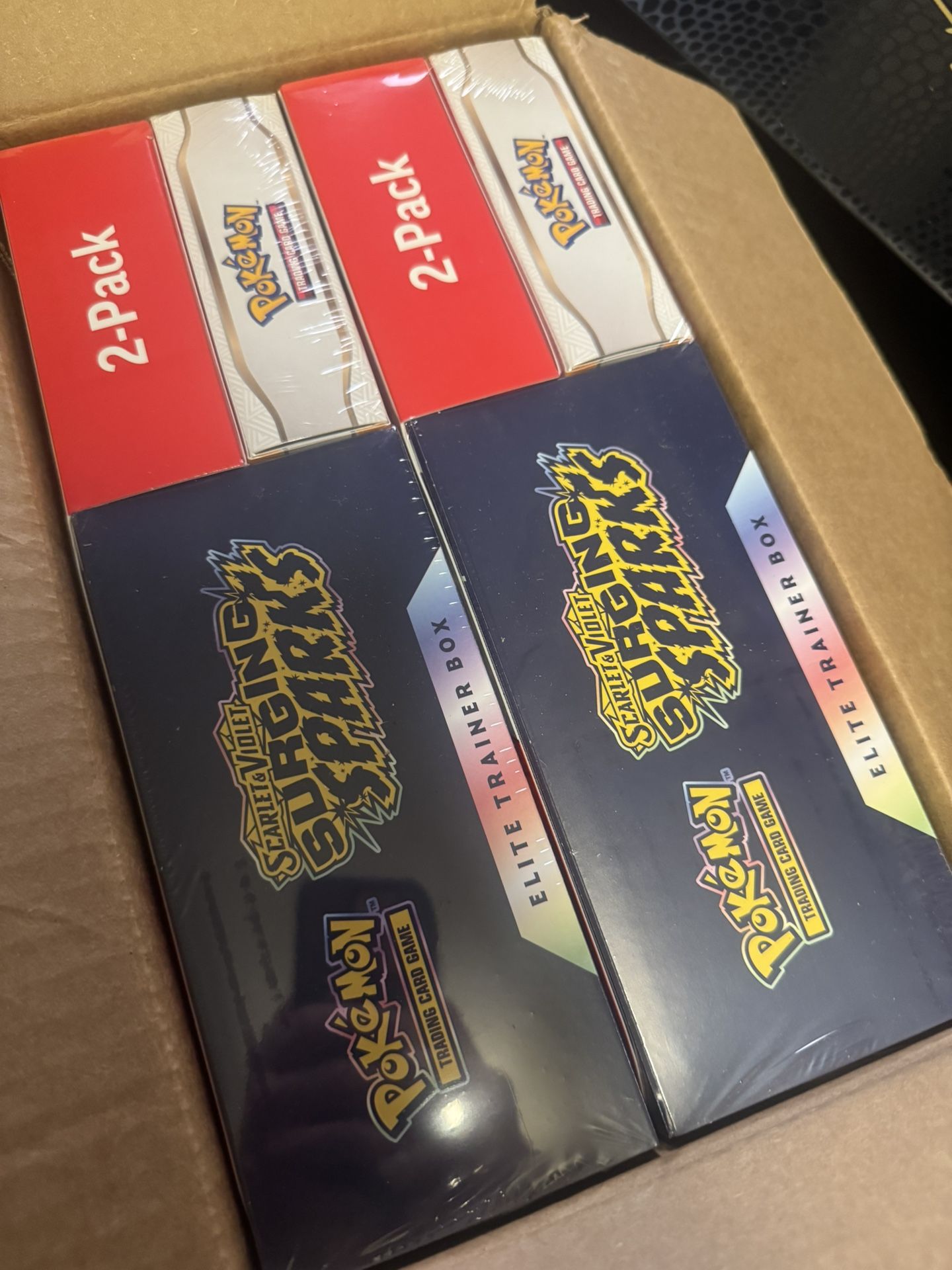 Surging Sparks 2-Pack Trainer Box And Booster Bundle Costco