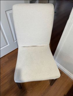 White fabric dining chairs