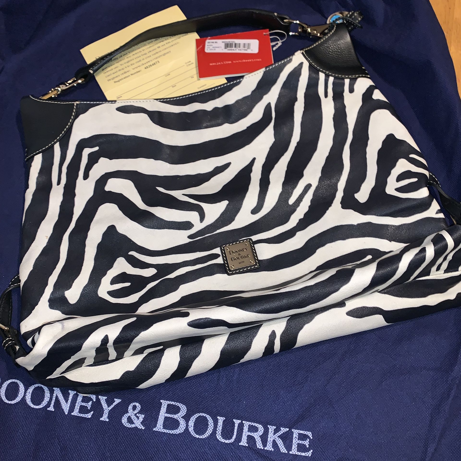 Like New Dooney & Bourke Zebra Print Leather Hobo Shoulder Bag/Purse $100.00 USD O.B.O