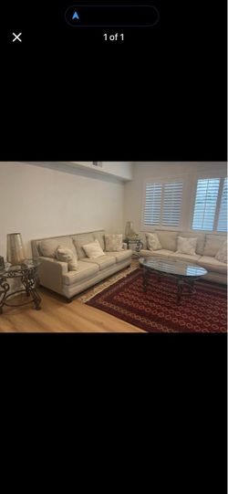 Moving Beige Sofa and Loveseat Set with Nailhead Trim