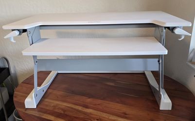 Ergotron WorkFit-TL standing desk converter in excellent condition.