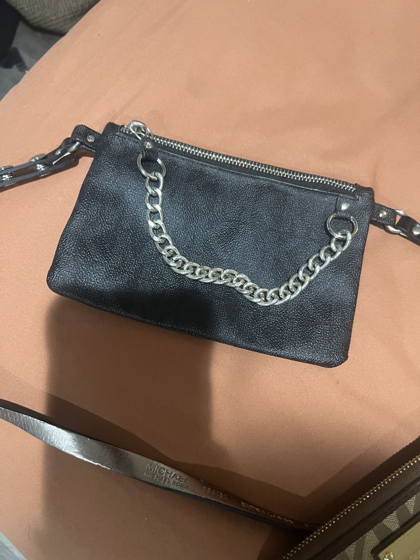 Michael Kors, official wallets and pouch