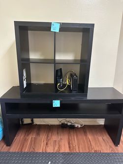 2 pieces here. The top is a 4 cube storage shelf labeled 25