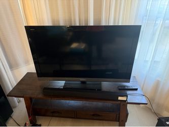Sony Large Screen TV + Sound System (Soundbar + Subwoofer)