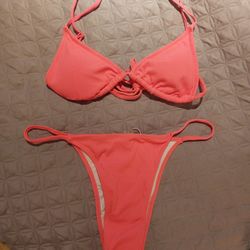 NEW BEAUTIFUL PINK BATHING SUIT SIZE XL.  SEE PHOTOS.  CASH PICKUP ONLY 