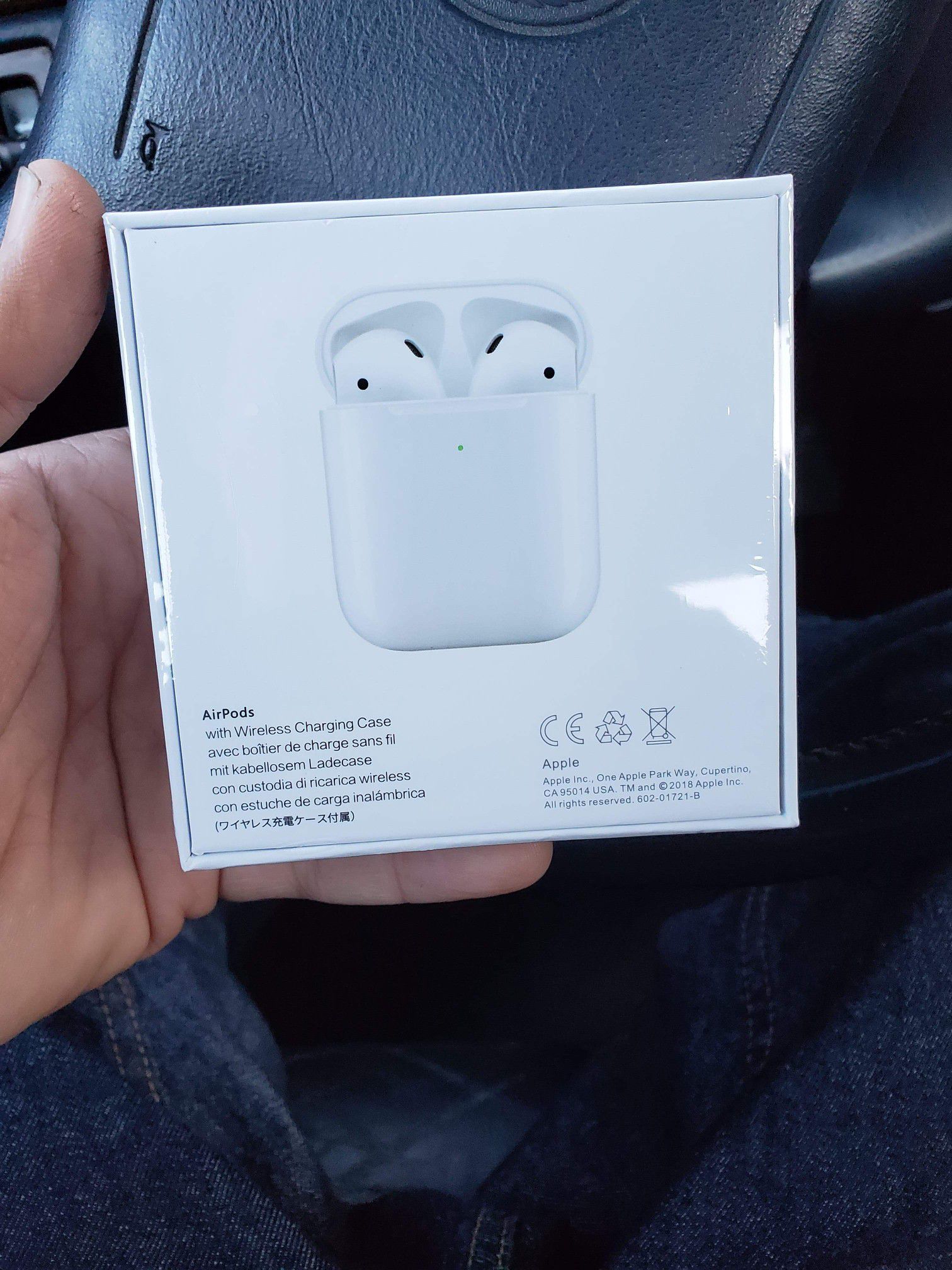 2nd generation Airpods with wireless charging case new in sealed box