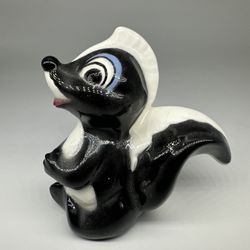 Vintage Disney Productions Flower Skunk From Bambi Parks Souvenir Ceramic Figure  THIS IS OLD!  4x4". Ceramic. Good condition. Slight crazing in his b