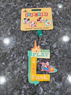 Disney Mickey & Minnie Mouse "Play in the Park" Metal Hanging Ornament.  Brand new with tags.  Smoke free home