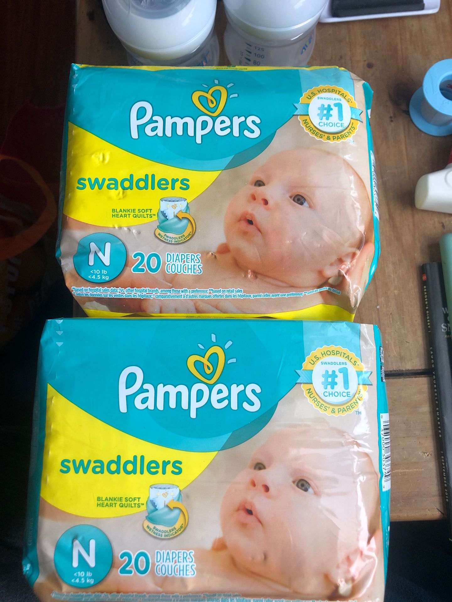 Two packs of newborn diapers