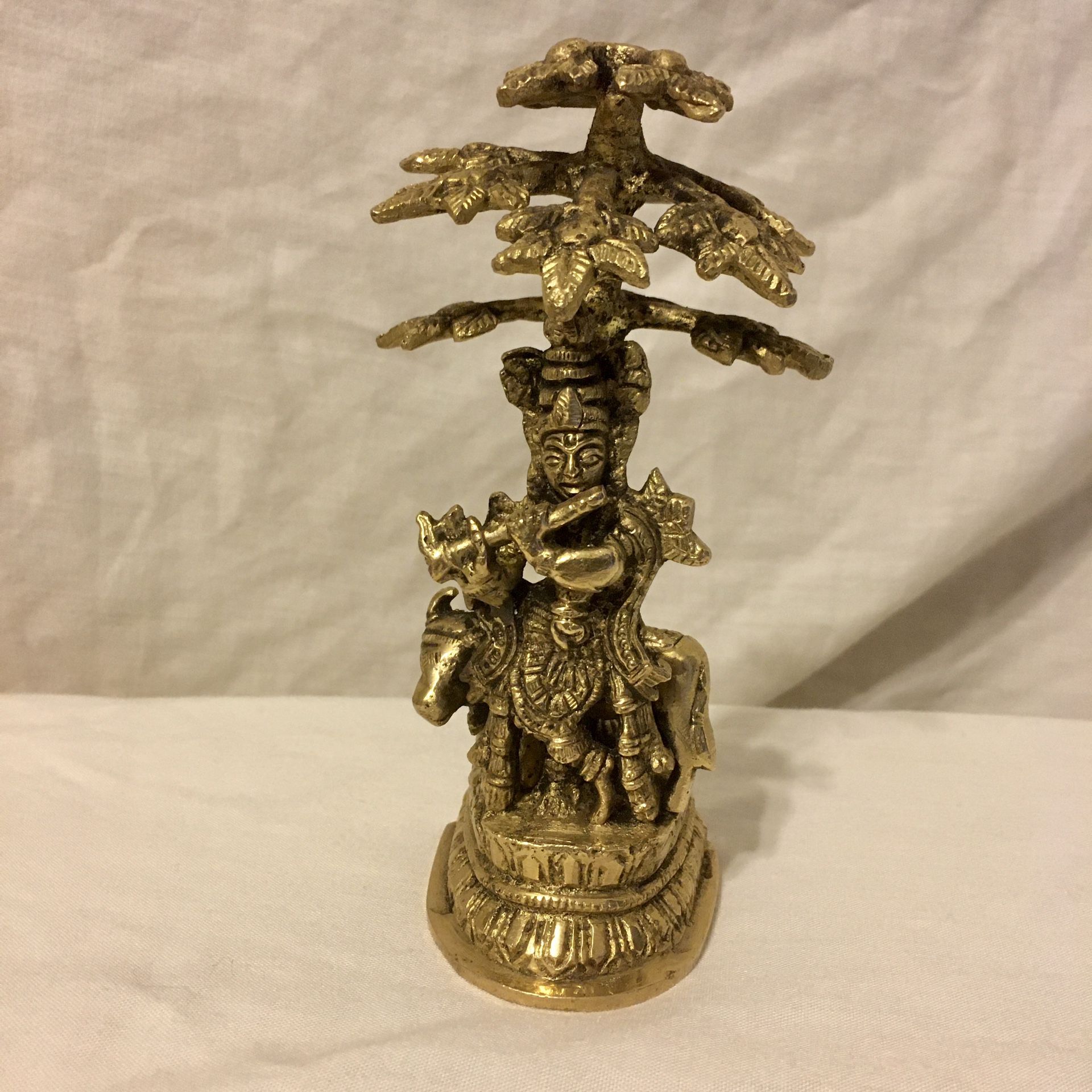 Lord Krishna under tree - solid brass