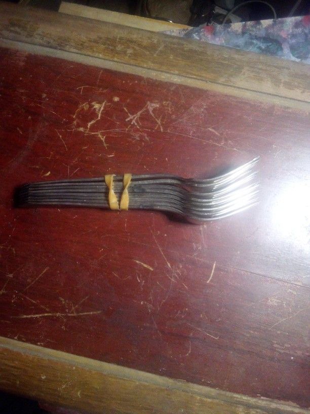 Eight Silver Forks