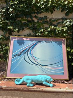 1980s vintage postmodern crawling light blue panther