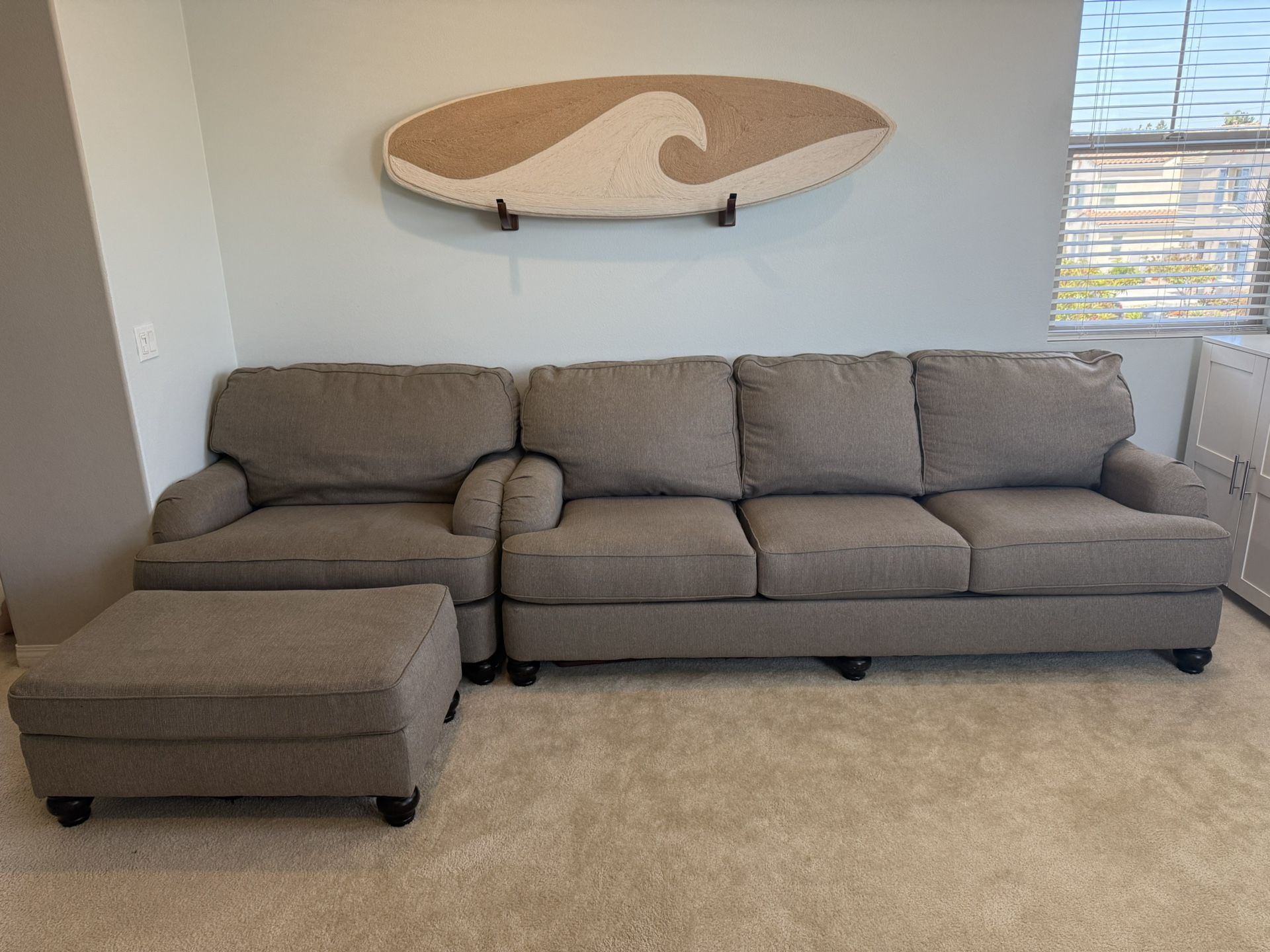 Couch with chaise/ oversized chair and ottoman.