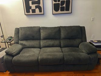 Ashley- Charcoal gray double recliner couch and rocking recliner set