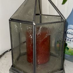 Glass lantern with candle