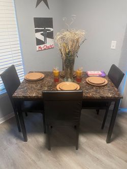 Table for sale with 3 chairs