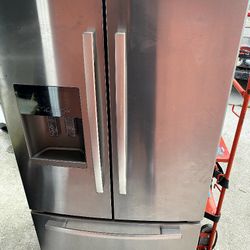 Whirlpool Gold French door stainless ice and water fridge works perfect with warranty