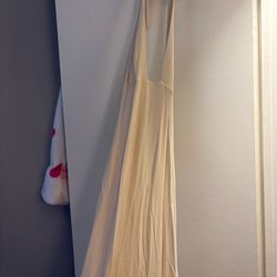Oh Polly halter top maxi dress with a slit. Size 4. Cream color