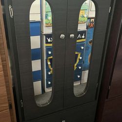 Tall closet with mirrors