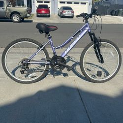 Purple Huffy Mountain Bike