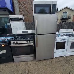 Stove Fridge And Microwave  Great Condition  Stainless  Warranty $950