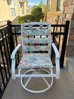 3- White metal chairs