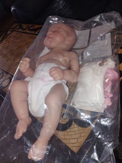 Baby doll with their clothes