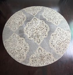 Round Patterned Rug with Rug Pad