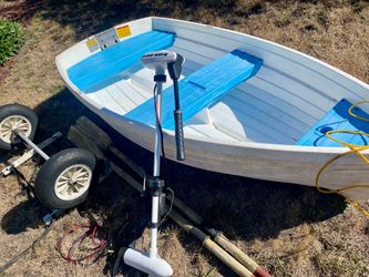 8’ Walker bay boat and motor