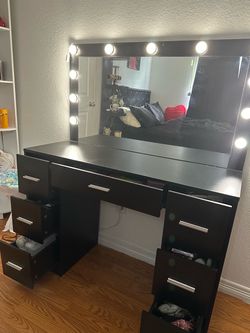 Black vanity with mirror lights