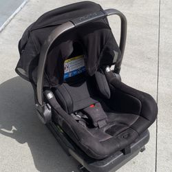 Nuna Pipa Lite LX baby car seat with base and infant insert