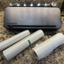 FoodSaver Multi-Use Food Preservation System with Handheld Vacuum Sealer & Bags VS3170