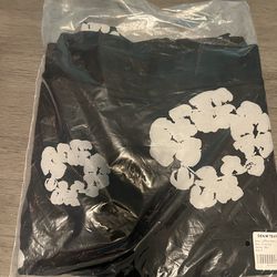 Black and grey denim tear