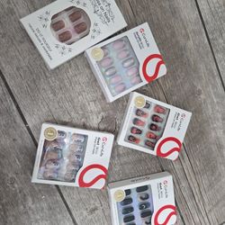 Five packs of press on or glue on nails
