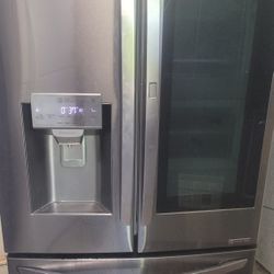 LG REFRIGERATOR WORKS GREAT NEW COMPRESSOR INSTALLED WORKS GREAT CAN DELIVER 
