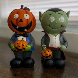 Halloween pumpkin and vampire figures