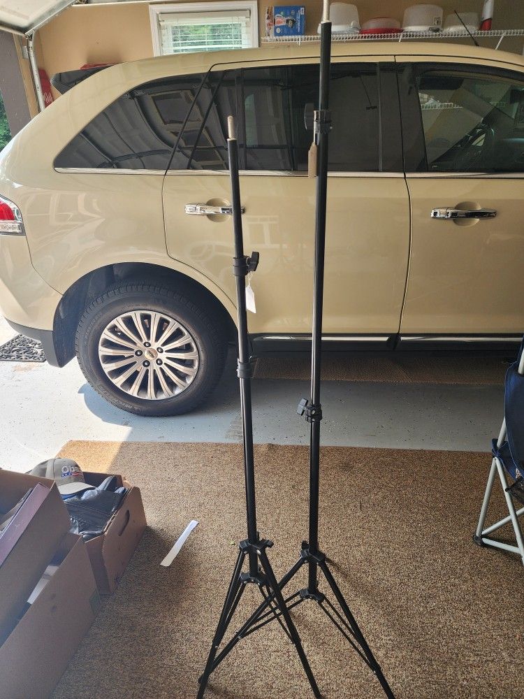 2 Tripods Support Adjustable $10 Each.