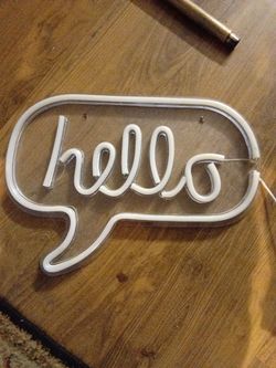 Hello sign neon pink and soft white connects to USB just like a phone you can put it into a battery pack and stick it on the back of your bike and dri