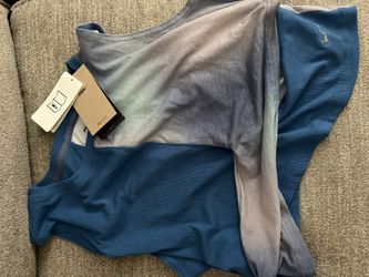 Two Nike Women’s Tops Fit Like A Large