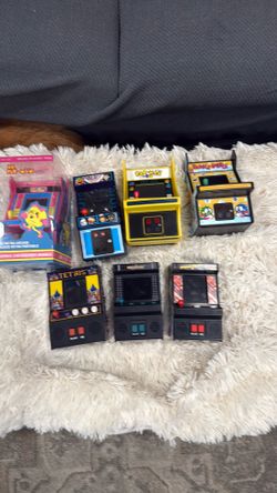 Portable retro arcades ms pac-man, stranger things palace arcade, tetris, pac-man, wrestlemania, asteroids, and bubble bobble