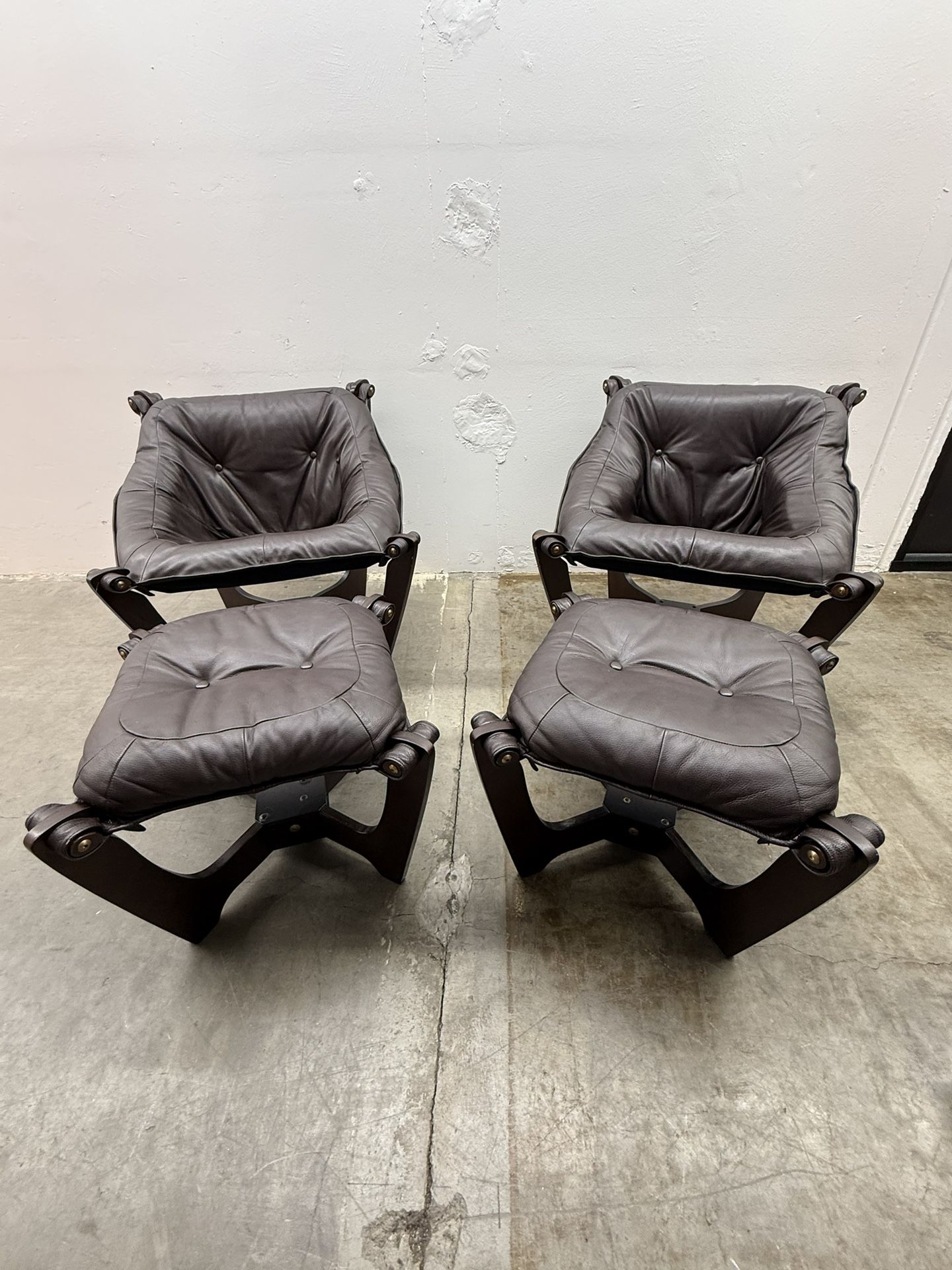 Brown Leather Luna Chairs + Ottomans 