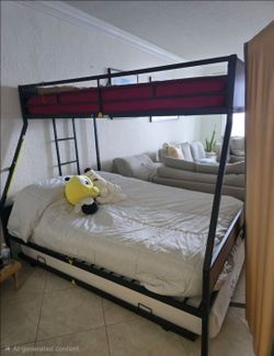 Bunk beds send a pull out bed with mattresses